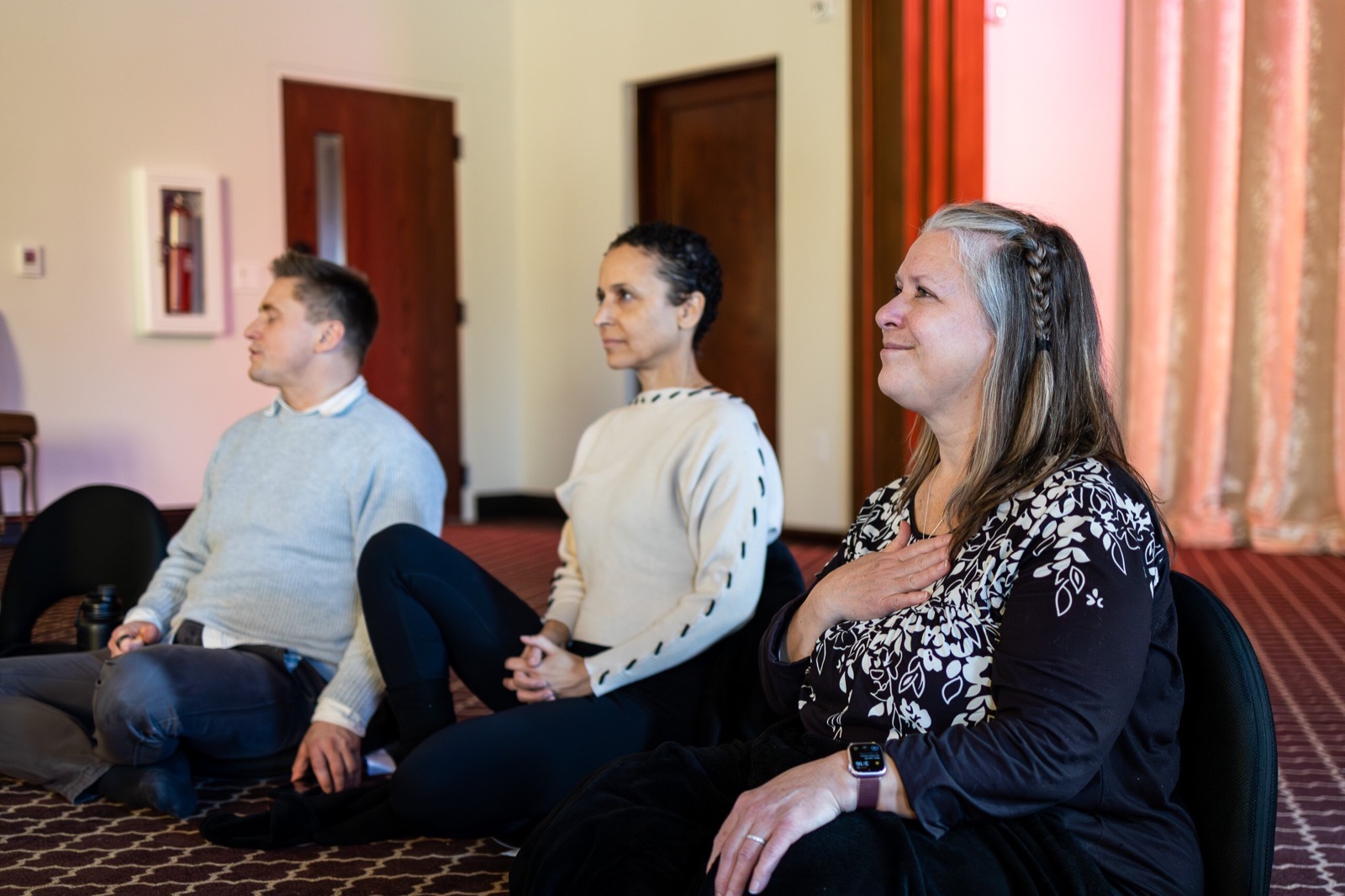 Heart iQ participants — hand on heart, presence