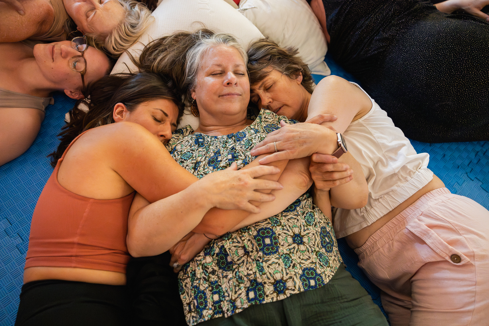 Heart iQ — women resting, being held